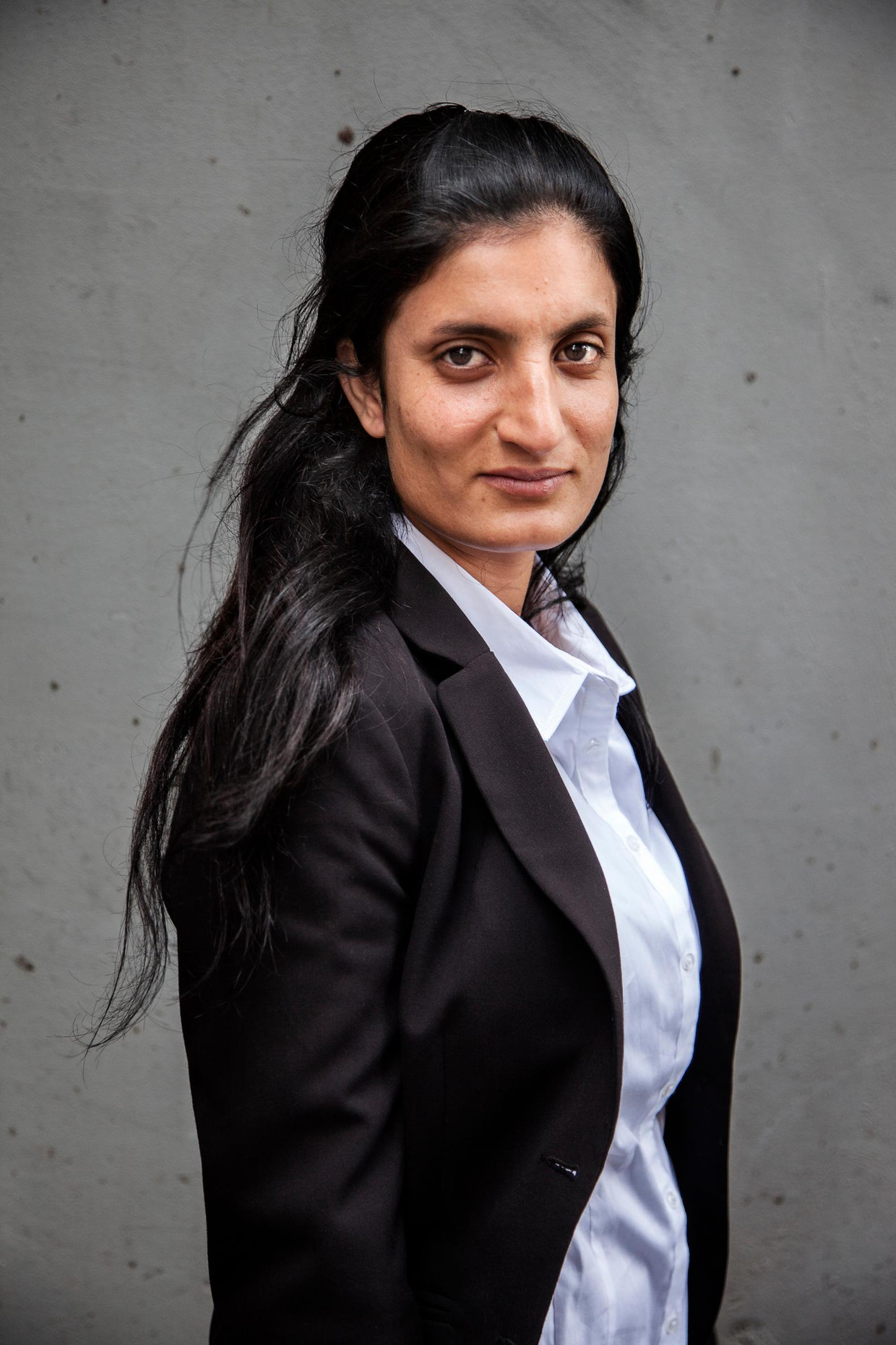 Parween Alhinto: 'Met een vriendin had ik een gat in de muur gevonden. We zijn erdoor gekropen en hebben ons eerst schuilgehouden' Beeld Ernst Coppejans